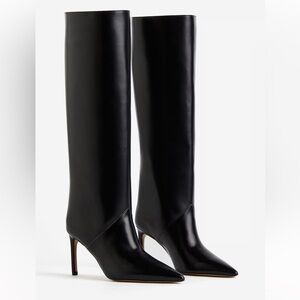 Knee high heeled boots